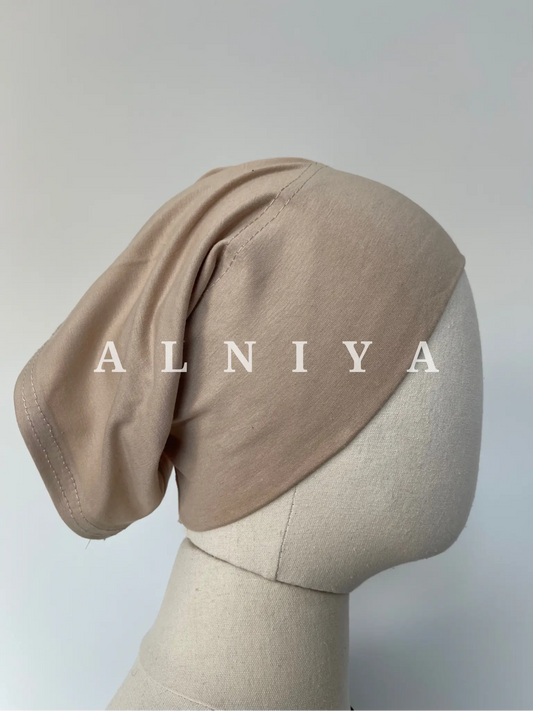 Beige tube cap